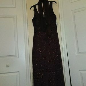 A maroon sparkly dress